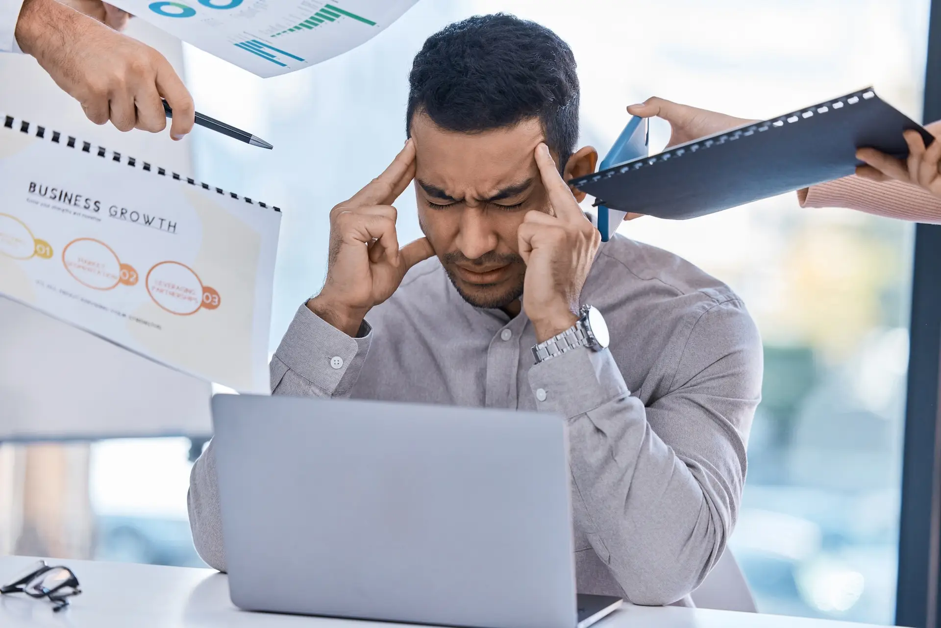 Stress, headache or burnout manager from employee paper, phone or laptop review schedule. Tired mar
